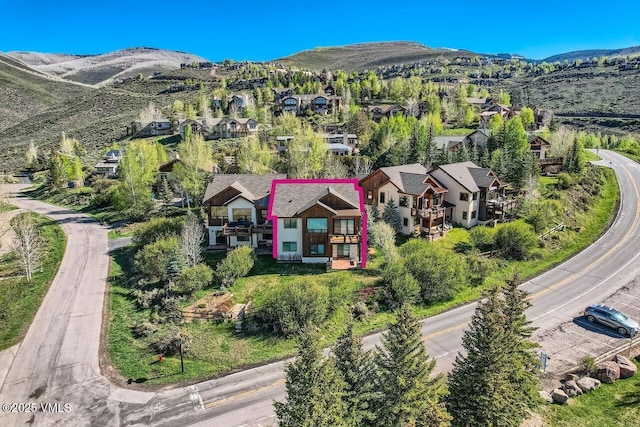 2900 June Creek Trl Unit B, Avon, CO 81620 - aerial view of residential area with property boundaries highlighted and mountains