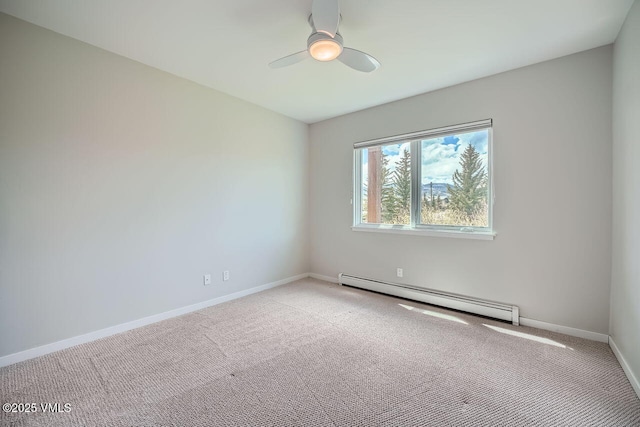 2900 June Creek Trl Unit B, Avon, CO 81620 - unfurnished room with baseboard heating, light colored carpet, baseboards, and a ceiling fan