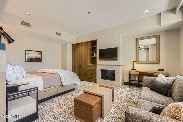 126 Riverfront Ln Unit 438, Avon, CO 81620 - bedroom featuring a fireplace and recessed lighting