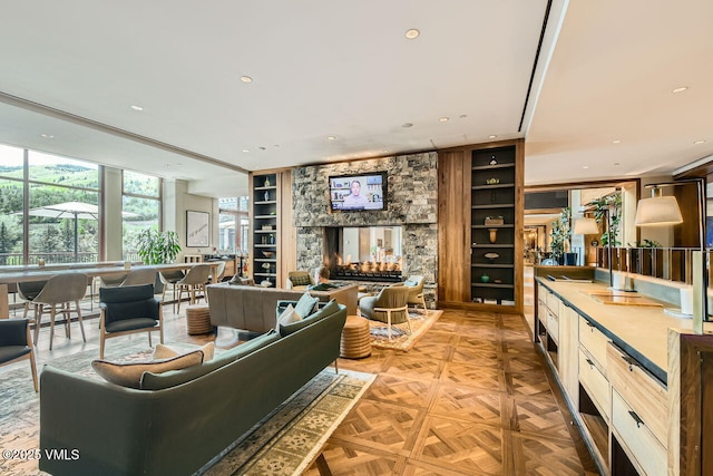 126 Riverfront Ln Unit 438, Avon, CO 81620 - living room featuring recessed lighting and built in shelves