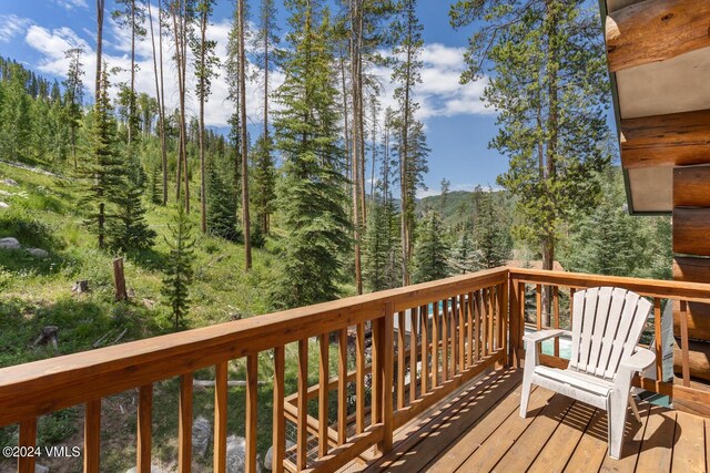 2219 Vermont Ct, Vail, CO 81657 - deck with a view of trees and a mountain view
