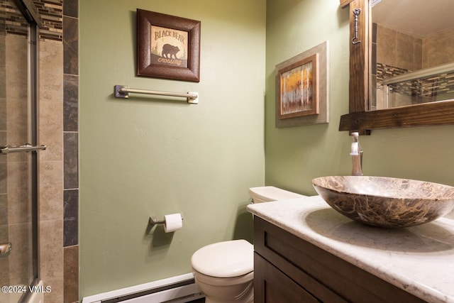 bathroom with a baseboard radiator, toilet, vanity, and walk in shower