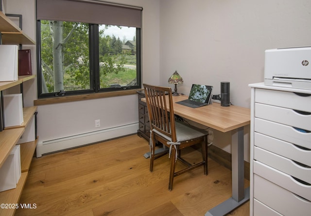 654 Gold Dust Dr W, Edwards, CO 81632 - home office featuring baseboard heating and light wood-style flooring