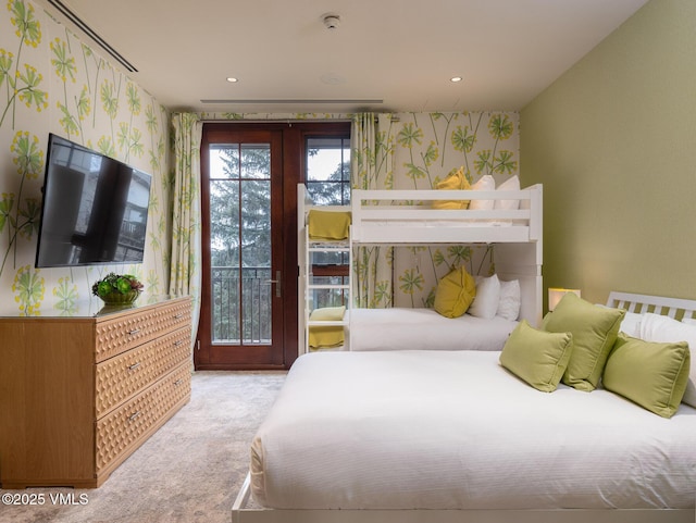 bedroom with french doors, carpet floors, access to outside, and wallpapered walls