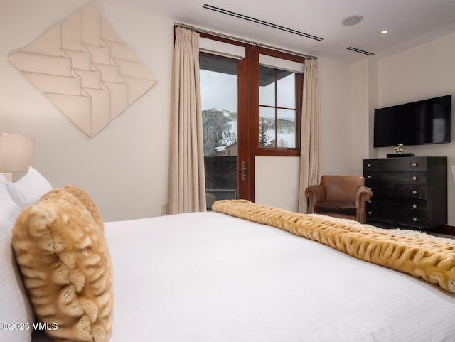 bedroom with visible vents and recessed lighting