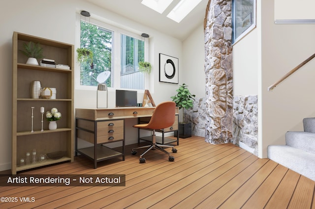 780 Deer Blvd, Avon, CO 81620 - office space featuring a skylight, wood finished floors, and vaulted ceiling