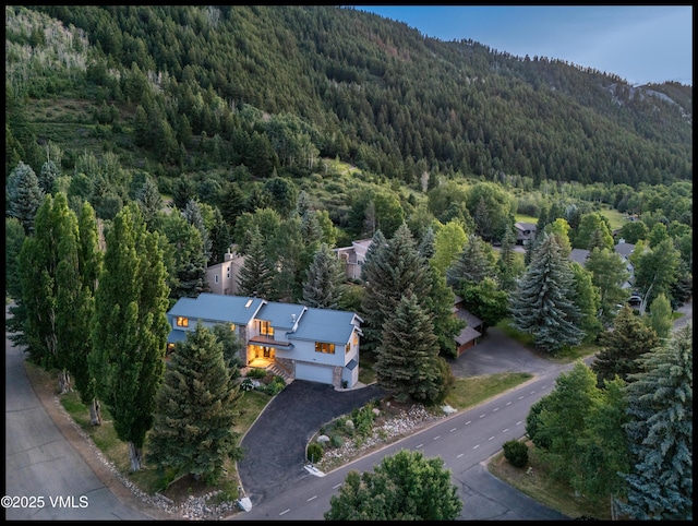 780 Deer Blvd, Avon, CO 81620 - aerial overview of property's location with a forest