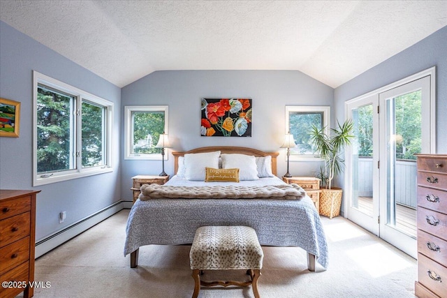 780 Deer Blvd, Avon, CO 81620 - bedroom with a baseboard heating unit, light carpet, access to outside, vaulted ceiling, and multiple windows