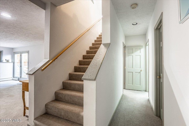 780 Deer Blvd, Avon, CO 81620 - staircase with a textured ceiling, carpet floors, and recessed lighting