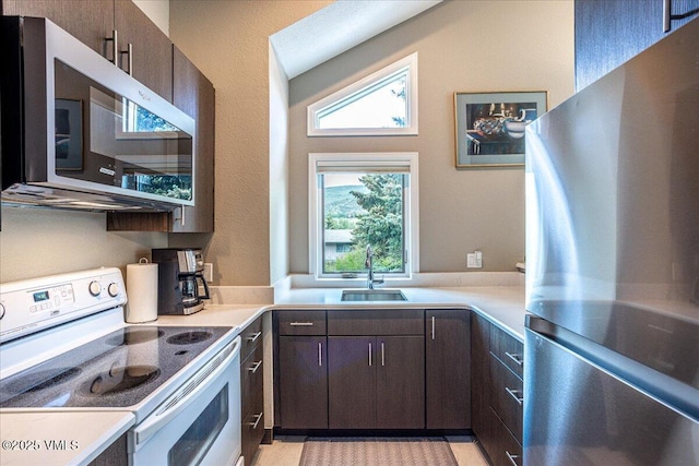 780 Deer Blvd, Avon, CO 81620 - kitchen featuring stainless steel appliances, dark brown cabinets, and light countertops