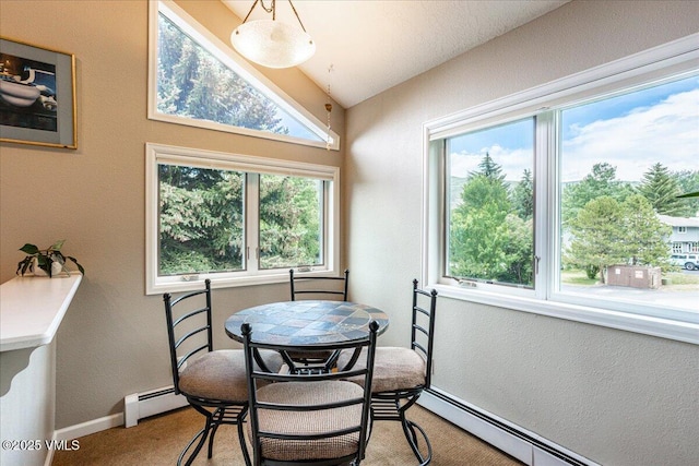 780 Deer Blvd, Avon, CO 81620 - dining room with baseboard heating, a textured wall, carpet floors, and vaulted ceiling