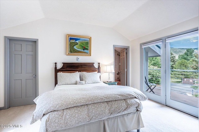 780 Deer Blvd, Avon, CO 81620 - bedroom featuring light colored carpet, vaulted ceiling, and access to outside