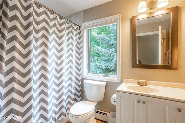 780 Deer Blvd, Avon, CO 81620 - bathroom featuring baseboard heating, vanity, and a shower with shower curtain