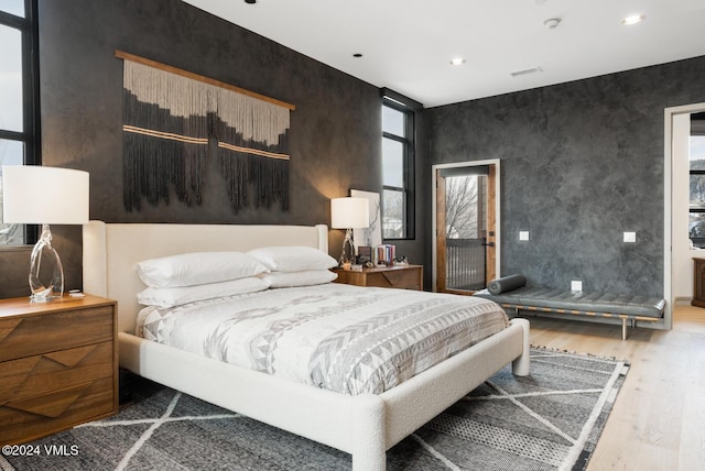 bedroom featuring light wood-type flooring