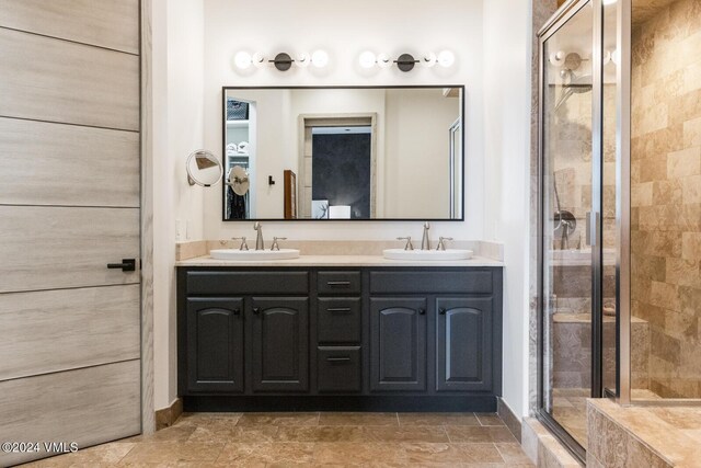 bathroom with vanity and walk in shower