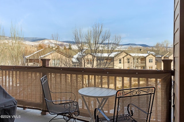 balcony with a deck with mountain view