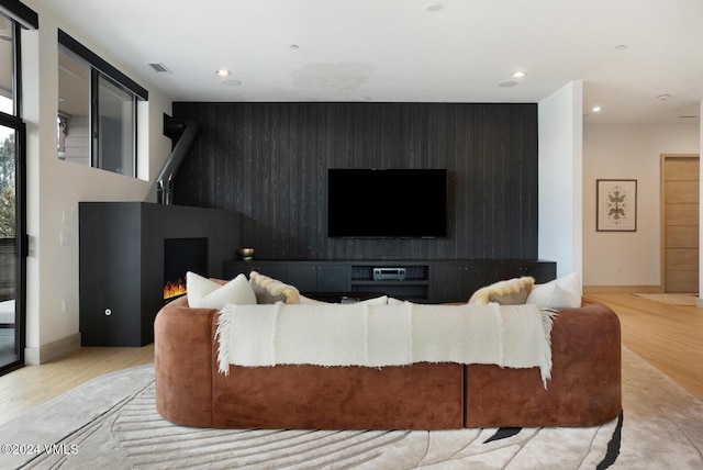 living room with light hardwood / wood-style floors