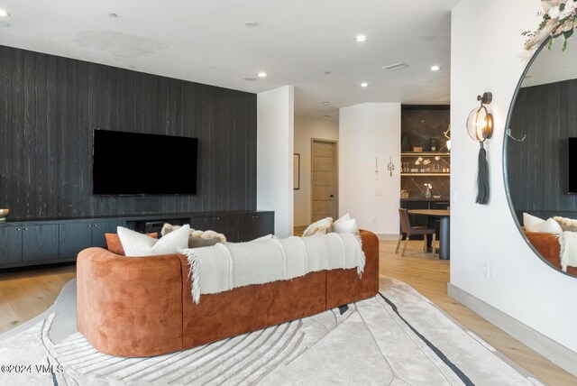 living room with light hardwood / wood-style floors