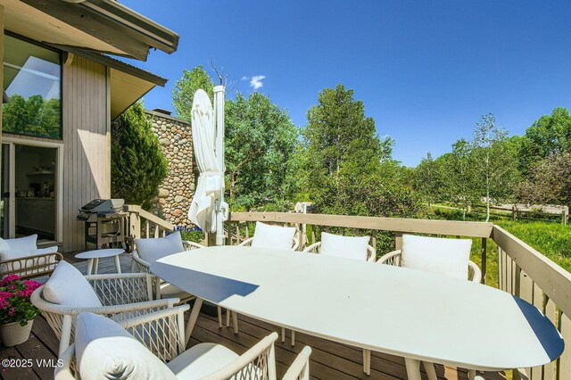 8 Charolais Cir, Edwards, CO 81632 - wooden terrace featuring outdoor dining area and area for grilling