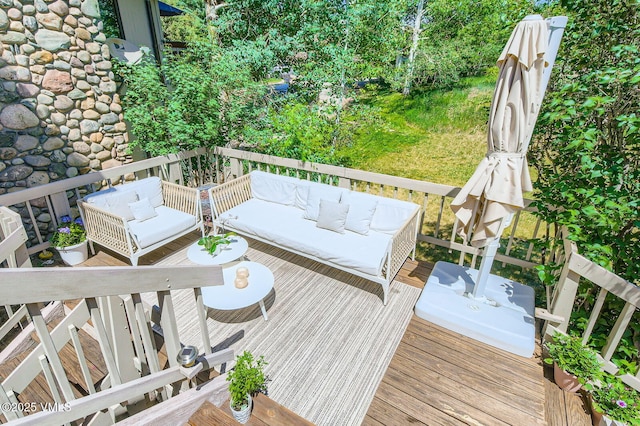 8 Charolais Cir, Edwards, CO 81632 - wooden deck featuring an outdoor hangout area