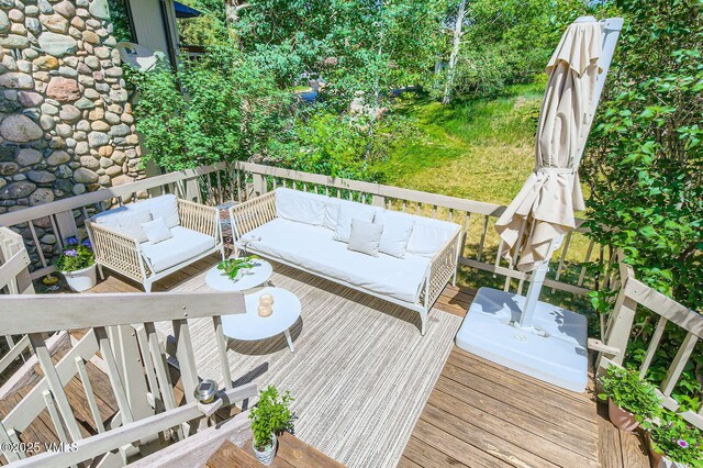 8 Charolais Cir, Edwards, CO 81632 - wooden deck featuring an outdoor hangout area
