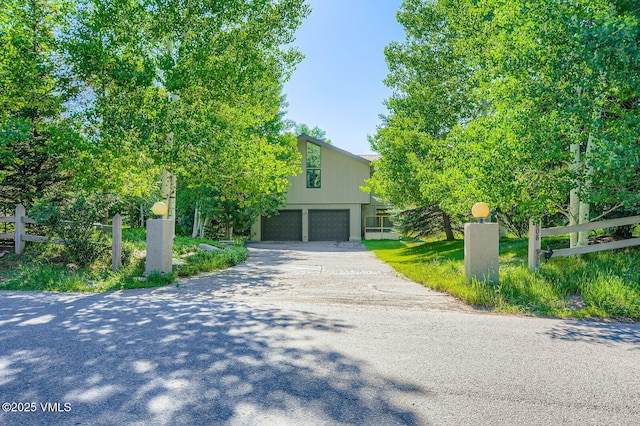 8 Charolais Cir, Edwards, CO 81632 - view of front facade with a garage and driveway