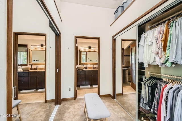 8 Charolais Cir, Edwards, CO 81632 - walk in closet featuring light colored carpet and a towering ceiling