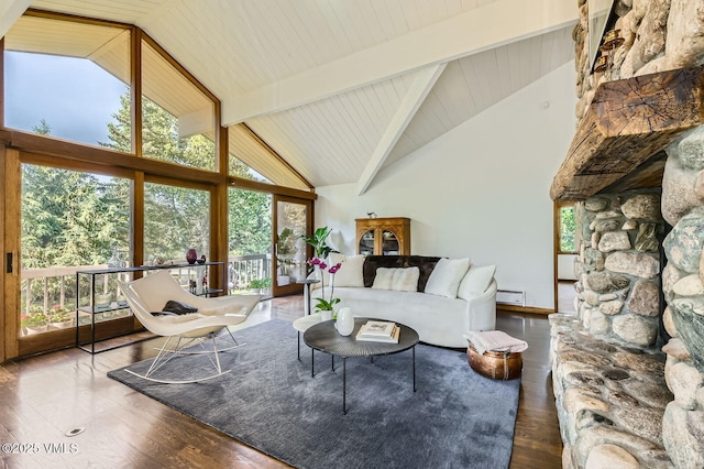 8 Charolais Cir, Edwards, CO 81632 - living room with high vaulted ceiling, wood finished floors, a baseboard heating unit, and a wooden ceiling with exposed beams