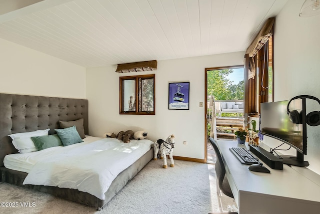 8 Charolais Cir, Edwards, CO 81632 - bedroom with light colored carpet, access to exterior, and wooden ceiling