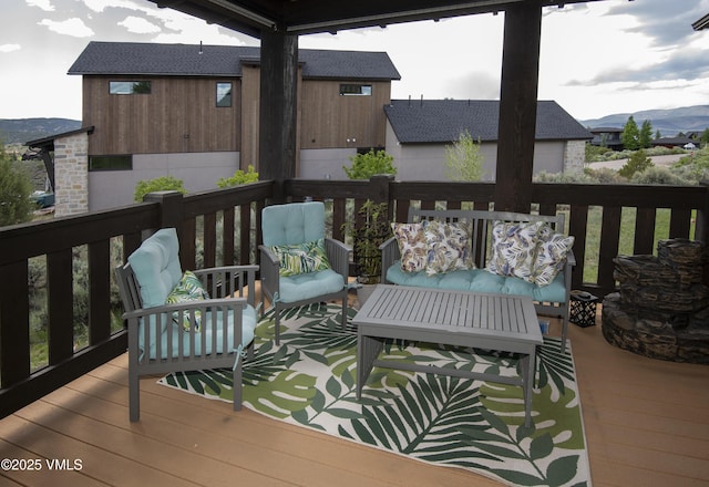 75 Aster Ct, Eagle, CO 81631 - wooden terrace featuring an outdoor living space and a mountain view