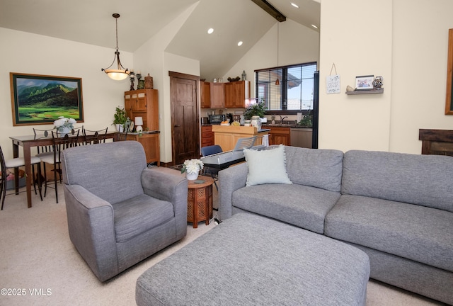 75 Aster Ct, Eagle, CO 81631 - living room featuring recessed lighting, high vaulted ceiling, beamed ceiling, and light carpet