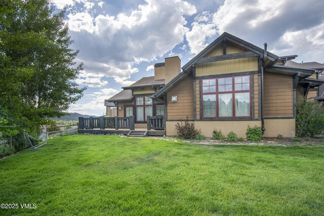 75 Aster Ct, Eagle, CO 81631 - back of house with a deck and a chimney