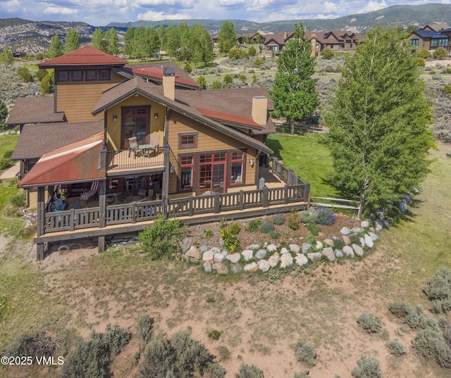 75 Aster Ct, Eagle, CO 81631 - view of front of property featuring a chimney and a deck with mountain view