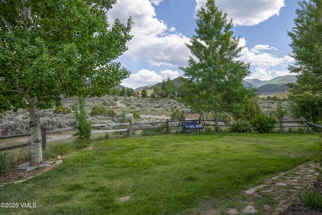 75 Aster Ct, Eagle, CO 81631 - staircase with a towering ceiling, a chandelier, and carpet