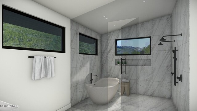 full bathroom featuring marble finish floor, walk in shower, a freestanding bath, tile walls, and recessed lighting