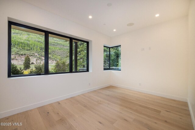 1487 Vail Valley Dr, Vail, CO 81657 - unfurnished room with light wood-style flooring and recessed lighting