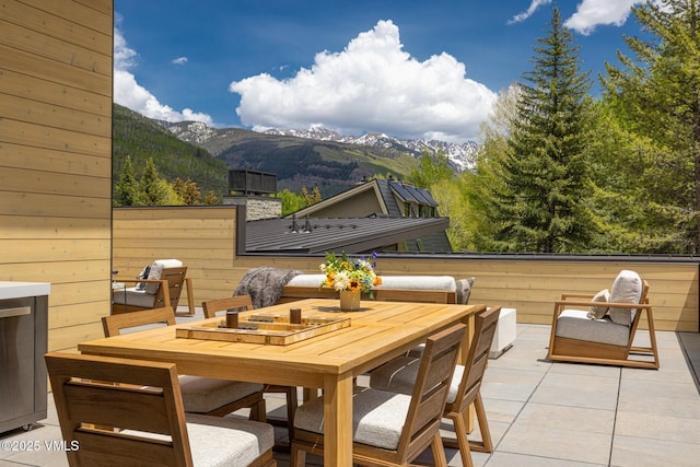 1487 Vail Valley Dr, Vail, CO 81657 - view of patio / terrace featuring outdoor dining area and a mountain view