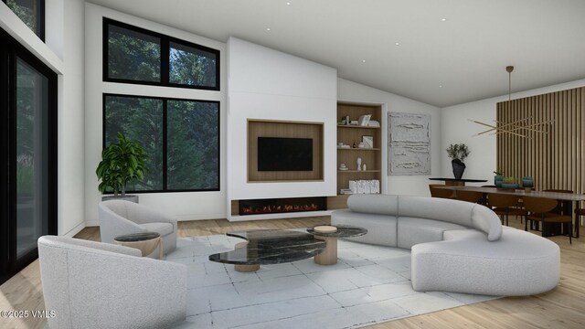 living area featuring high vaulted ceiling, a warm lit fireplace, built in shelves, and wood finished floors