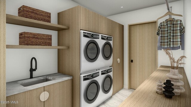 laundry room with stacked washer / dryer, laundry area, and a sink