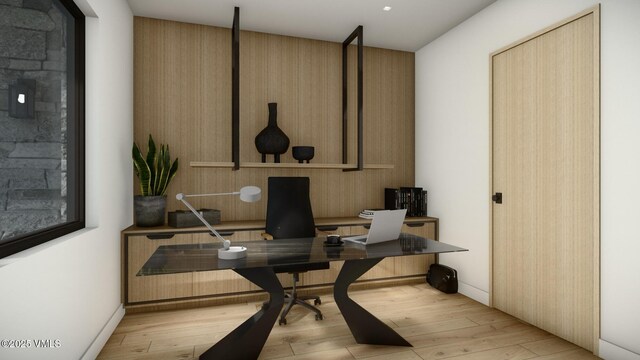 home office featuring light wood-style floors and baseboards