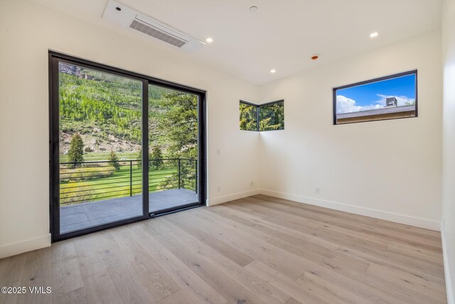 1487 Vail Valley Dr, Vail, CO 81657 - spare room featuring light wood-type flooring and recessed lighting