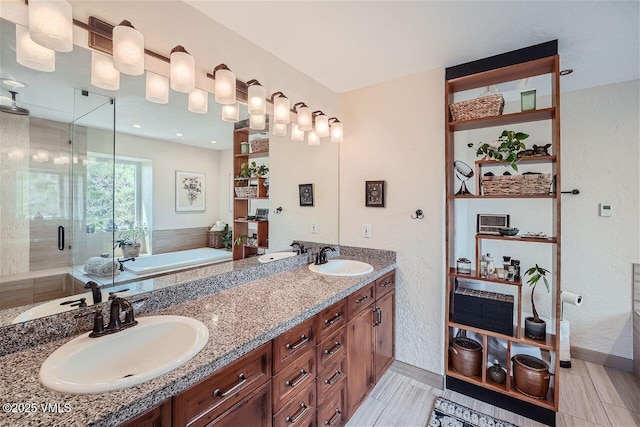 3078 Wildridge Rd Unit D, Avon, CO 81620 - full bath with a shower stall, a garden tub, double vanity, and a textured wall