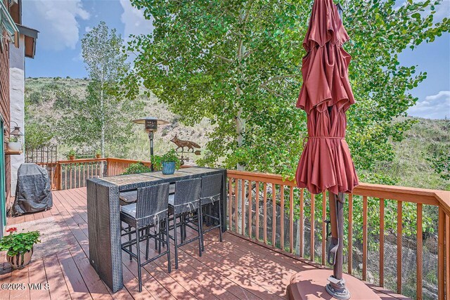3078 Wildridge Rd Unit D, Avon, CO 81620 - wooden deck featuring outdoor dining area