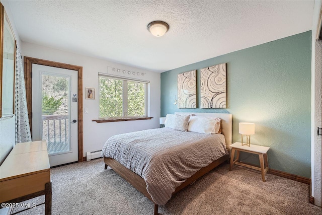 3078 Wildridge Rd Unit D, Avon, CO 81620 - bedroom featuring a baseboard heating unit, carpet, a textured wall, and a textured ceiling