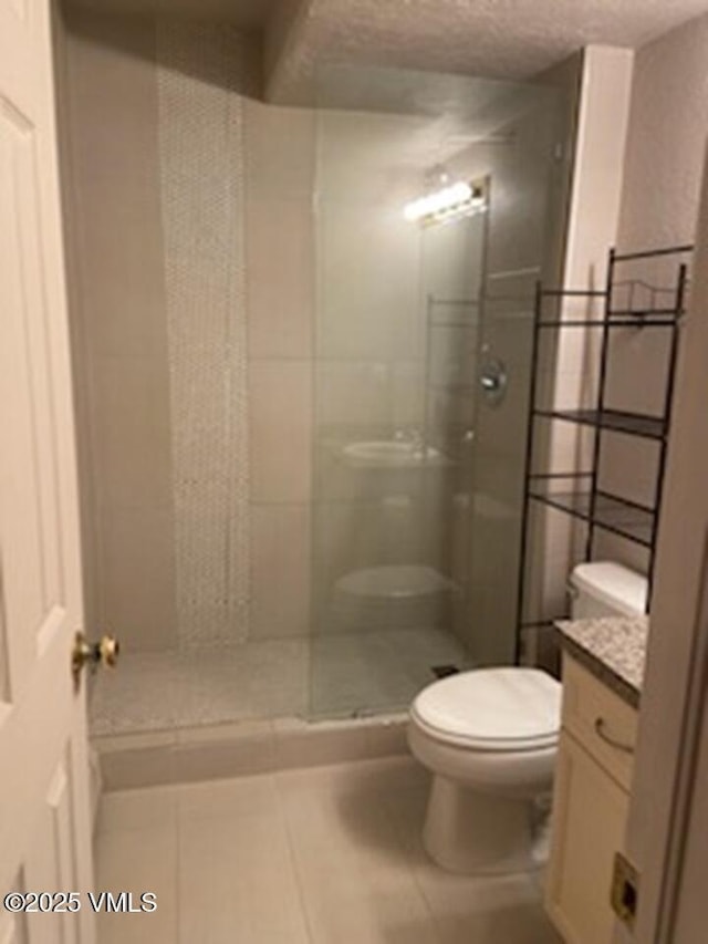 3078 Wildridge Rd Unit D, Avon, CO 81620 - full bathroom featuring vanity, a stall shower, and tile patterned floors