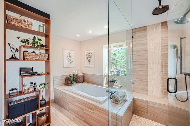 3078 Wildridge Rd Unit D, Avon, CO 81620 - bathroom featuring a shower stall, a bath, and recessed lighting