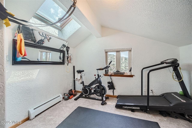 3078 Wildridge Rd Unit D, Avon, CO 81620 - workout room with a baseboard heating unit, a textured wall, a skylight, carpet, and lofted ceiling