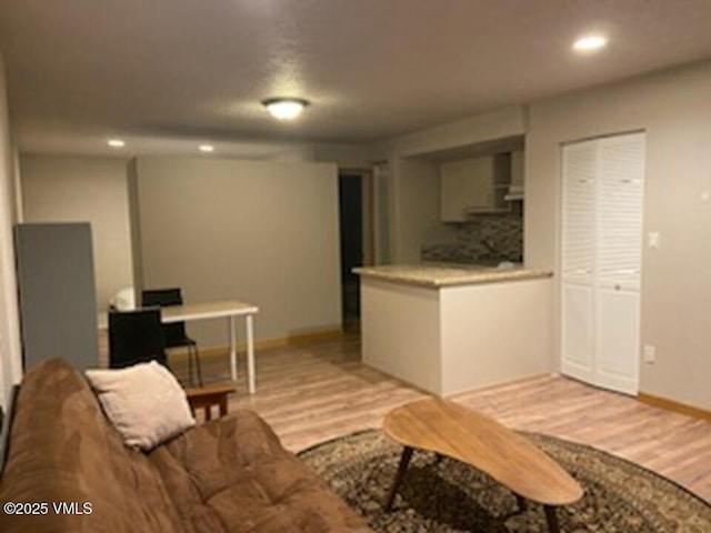 3078 Wildridge Rd Unit D, Avon, CO 81620 - living area with light wood-style floors and recessed lighting