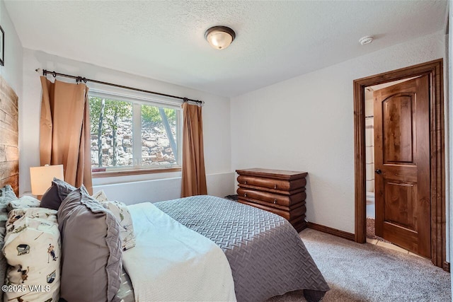 3078 Wildridge Rd Unit D, Avon, CO 81620 - bedroom featuring carpet floors and a textured ceiling