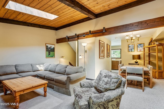 2540 Kinnikinnick Rd Unit G-2, Vail, CO 81657 - living area featuring a barn door, carpet, a wood ceiling with exposed beams, and a chandelier